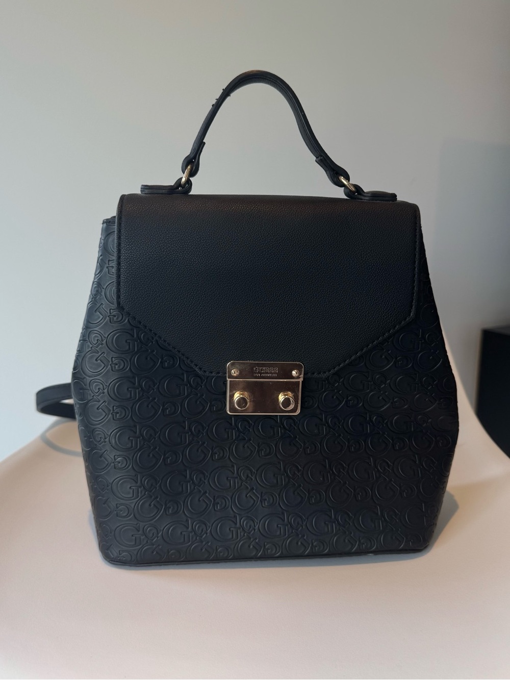 GUESS Black Embossed Logo Backpack with Gold-Tone Lock